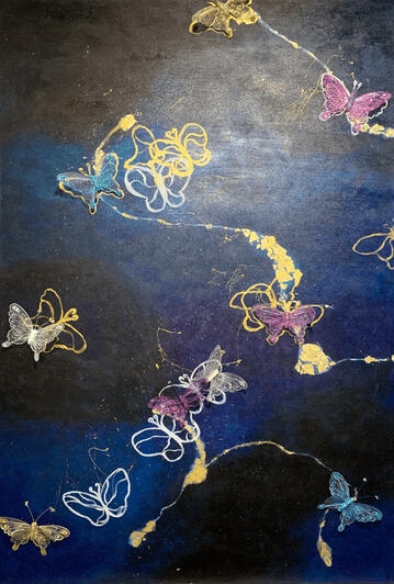 Butterfly painting. I used glue gun to attach the butterfly cut out to the canvas. This was my first time making use of those materials.